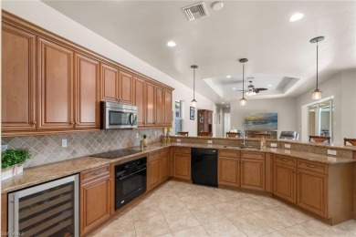 Welcome to 20060 Markward Crossing--a showstopping Villa Grande on The Club At Grandezza in Florida - for sale on GolfHomes.com, golf home, golf lot