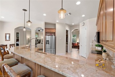 Welcome to 20060 Markward Crossing--a showstopping Villa Grande on The Club At Grandezza in Florida - for sale on GolfHomes.com, golf home, golf lot