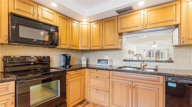 Beautifully Renovated 1st-Floor Corner Condo by the Pool in on Wynmoor Golf Course in Florida - for sale on GolfHomes.com, golf home, golf lot