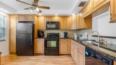 Beautifully Renovated 1st-Floor Corner Condo by the Pool in on Wynmoor Golf Course in Florida - for sale on GolfHomes.com, golf home, golf lot