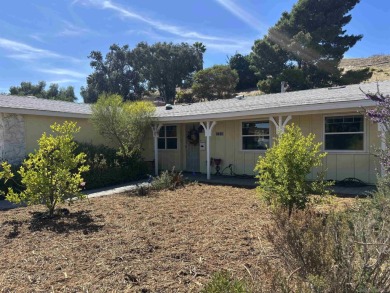 Welcome to your next chapter! This warm and inviting 4-bedroom on Carlton Oaks Country Club in California - for sale on GolfHomes.com, golf home, golf lot