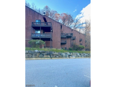 IMMACULATE TWO-BEDROOM MULTILEVEL CONDO. FRESHLY PAINTED, NEWER on Minerals Golf Club in New Jersey - for sale on GolfHomes.com, golf home, golf lot