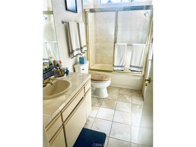 END UNIT..... ON THE VERY TRANQUIL  (PGA) *7 LAGO GOLF* COURSE on Desert Princess Country Club in California - for sale on GolfHomes.com, golf home, golf lot