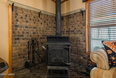 Escape to the cool mountain air in this inviting 3BR/2BA home in on Pinewood Country Club in Arizona - for sale on GolfHomes.com, golf home, golf lot