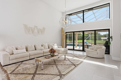 Exquisitely renovated 4BR/4BA lakefront estate in the desirable on  in Florida - for sale on GolfHomes.com, golf home, golf lot