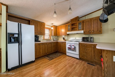 Escape to the cool mountain air in this inviting 3BR/2BA home in on Pinewood Country Club in Arizona - for sale on GolfHomes.com, golf home, golf lot