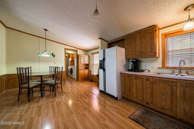 Escape to the cool mountain air in this inviting 3BR/2BA home in on Pinewood Country Club in Arizona - for sale on GolfHomes.com, golf home, golf lot