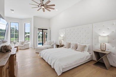 Exquisitely renovated 4BR/4BA lakefront estate in the desirable on  in Florida - for sale on GolfHomes.com, golf home, golf lot