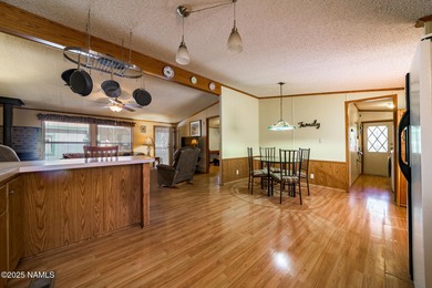 Escape to the cool mountain air in this inviting 3BR/2BA home in on Pinewood Country Club in Arizona - for sale on GolfHomes.com, golf home, golf lot