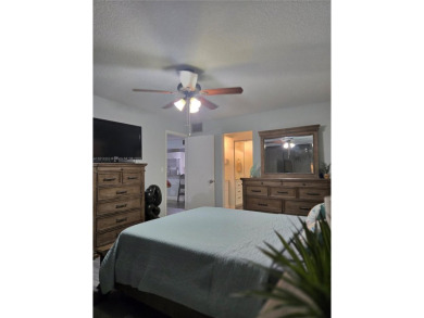 Discover the perfect family home, thoughtfully updated for on Pembroke Lakes Golf Club in Florida - for sale on GolfHomes.com, golf home, golf lot