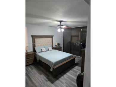 Discover the perfect family home, thoughtfully updated for on Pembroke Lakes Golf Club in Florida - for sale on GolfHomes.com, golf home, golf lot
