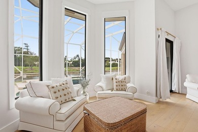 Exquisitely renovated 4BR/4BA lakefront estate in the desirable on  in Florida - for sale on GolfHomes.com, golf home, golf lot