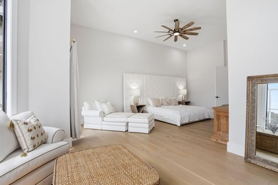 Exquisitely renovated 4BR/4BA lakefront estate in the desirable on  in Florida - for sale on GolfHomes.com, golf home, golf lot