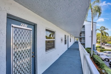 Model Condo-Step into this Stunning Corner 2-Bedroom 2-Bath on Oriole Golf and Tennis Club in Florida - for sale on GolfHomes.com, golf home, golf lot