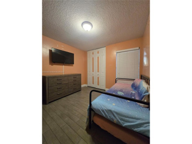 Discover the perfect family home, thoughtfully updated for on Pembroke Lakes Golf Club in Florida - for sale on GolfHomes.com, golf home, golf lot