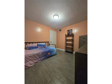 Discover the perfect family home, thoughtfully updated for on Pembroke Lakes Golf Club in Florida - for sale on GolfHomes.com, golf home, golf lot