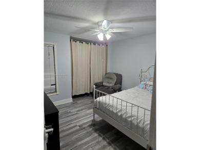 Discover the perfect family home, thoughtfully updated for on Pembroke Lakes Golf Club in Florida - for sale on GolfHomes.com, golf home, golf lot