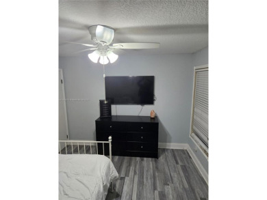 Discover the perfect family home, thoughtfully updated for on Pembroke Lakes Golf Club in Florida - for sale on GolfHomes.com, golf home, golf lot