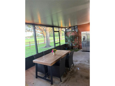 Discover the perfect family home, thoughtfully updated for on Pembroke Lakes Golf Club in Florida - for sale on GolfHomes.com, golf home, golf lot