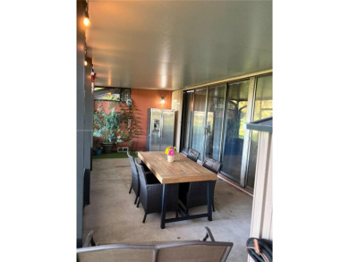 Discover the perfect family home, thoughtfully updated for on Pembroke Lakes Golf Club in Florida - for sale on GolfHomes.com, golf home, golf lot