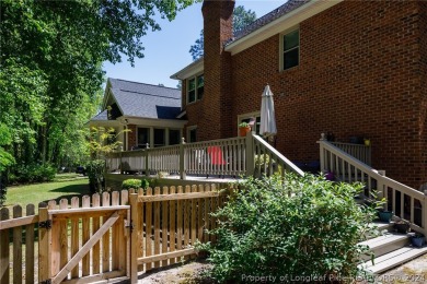 Come check out this exquisite two-story home nestled in the on Gates Four Golf and Country Club in North Carolina - for sale on GolfHomes.com, golf home, golf lot