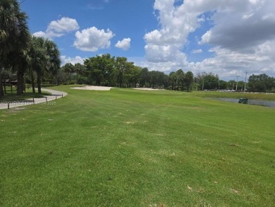 Discover the perfect family home, thoughtfully updated for on Pembroke Lakes Golf Club in Florida - for sale on GolfHomes.com, golf home, golf lot