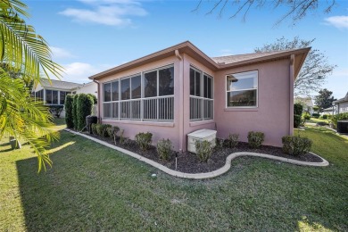 Welcome to this stunning TURNKEY DESIGNER Jasmine model home on The Links of Spruce Creek in Florida - for sale on GolfHomes.com, golf home, golf lot