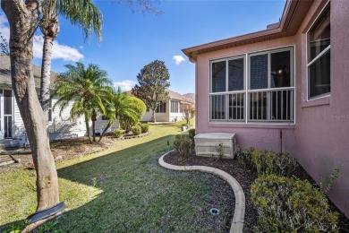 Welcome to this stunning TURNKEY DESIGNER Jasmine model home on The Links of Spruce Creek in Florida - for sale on GolfHomes.com, golf home, golf lot