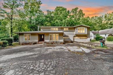 Charming 4-Bedroom Home in Carolina Trace with Unique Features! on Carolina Trace Country Club in North Carolina - for sale on GolfHomes.com, golf home, golf lot