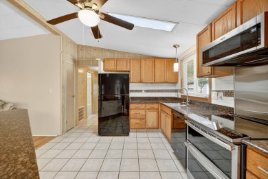 LAND OWNED--NO LAND LEASE! Welcome to 2629 Caper Court in the on Savanna Golf Club in Florida - for sale on GolfHomes.com, golf home, golf lot