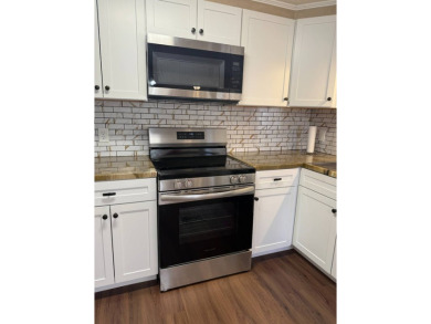 THIS LOVELY, 2/2 MANUFACTURED HOME IS ON LEASED LAND.  MONTHLY on Pine Lakes Country Club in Florida - for sale on GolfHomes.com, golf home, golf lot