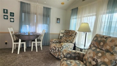UPDATED SINGLE WIDE MOBILE HOME IN ACTIVE 55+ COMMUNITY! Stay on River Run Golf Links in Florida - for sale on GolfHomes.com, golf home, golf lot