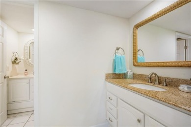 Enjoy relaxed resort-style living in this condo overlooking the on Ocean Village Golf Course in Florida - for sale on GolfHomes.com, golf home, golf lot