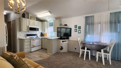UPDATED SINGLE WIDE MOBILE HOME IN ACTIVE 55+ COMMUNITY! Stay on River Run Golf Links in Florida - for sale on GolfHomes.com, golf home, golf lot