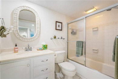 Enjoy relaxed resort-style living in this condo overlooking the on Ocean Village Golf Course in Florida - for sale on GolfHomes.com, golf home, golf lot