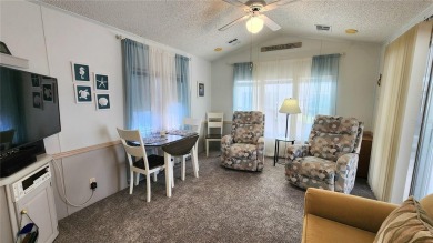 UPDATED SINGLE WIDE MOBILE HOME IN ACTIVE 55+ COMMUNITY! Stay on River Run Golf Links in Florida - for sale on GolfHomes.com, golf home, golf lot