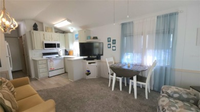 UPDATED SINGLE WIDE MOBILE HOME IN ACTIVE 55+ COMMUNITY! Stay on River Run Golf Links in Florida - for sale on GolfHomes.com, golf home, golf lot