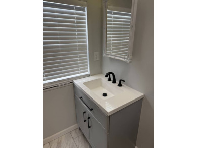 THIS LOVELY, 2/2 MANUFACTURED HOME IS ON LEASED LAND.  MONTHLY on Pine Lakes Country Club in Florida - for sale on GolfHomes.com, golf home, golf lot