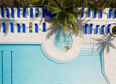 Enjoy relaxed resort-style living in this condo overlooking the on Ocean Village Golf Course in Florida - for sale on GolfHomes.com, golf home, golf lot
