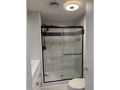 THIS LOVELY, 2/2 MANUFACTURED HOME IS ON LEASED LAND.  MONTHLY on Pine Lakes Country Club in Florida - for sale on GolfHomes.com, golf home, golf lot