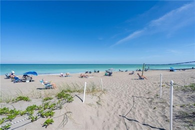 Enjoy relaxed resort-style living in this condo overlooking the on Ocean Village Golf Course in Florida - for sale on GolfHomes.com, golf home, golf lot
