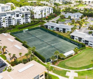Enjoy relaxed resort-style living in this condo overlooking the on Ocean Village Golf Course in Florida - for sale on GolfHomes.com, golf home, golf lot