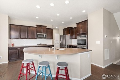 Immaculate home, built in 2017, in the highly sought-after Water on Pelican Lakes Golf and Country Club in Colorado - for sale on GolfHomes.com, golf home, golf lot