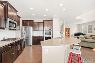 Immaculate home, built in 2017, in the highly sought-after Water on Pelican Lakes Golf and Country Club in Colorado - for sale on GolfHomes.com, golf home, golf lot
