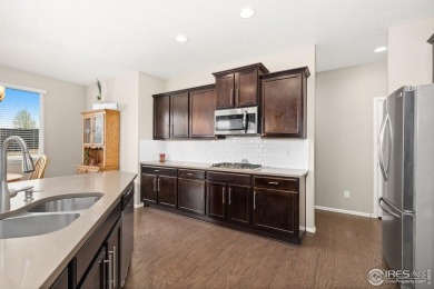 Immaculate home, built in 2017, in the highly sought-after Water on Pelican Lakes Golf and Country Club in Colorado - for sale on GolfHomes.com, golf home, golf lot