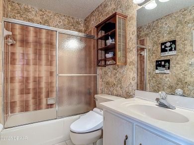 This 3 bedroom 2 bath end corner unit is nestled on the top on Indigo Lakes Golf Club in Florida - for sale on GolfHomes.com, golf home, golf lot