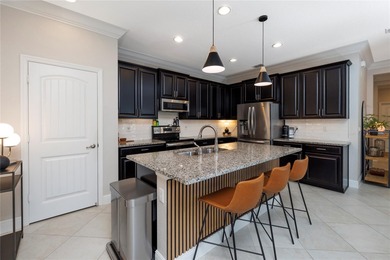 Discover effortless Florida living in your updated modern style on The Saints At Port St Lucie Golf Course in Florida - for sale on GolfHomes.com, golf home, golf lot