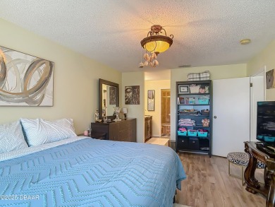 This 3 bedroom 2 bath end corner unit is nestled on the top on Indigo Lakes Golf Club in Florida - for sale on GolfHomes.com, golf home, golf lot