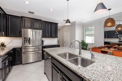 Discover effortless Florida living in your updated modern style on The Saints At Port St Lucie Golf Course in Florida - for sale on GolfHomes.com, golf home, golf lot