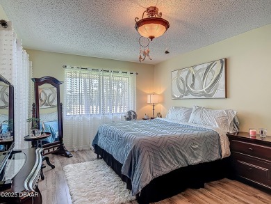 This 3 bedroom 2 bath end corner unit is nestled on the top on Indigo Lakes Golf Club in Florida - for sale on GolfHomes.com, golf home, golf lot